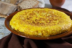 Pedir con mínimo un día de antelación Tortilla de patata. Con cebolla | Sin cebolla